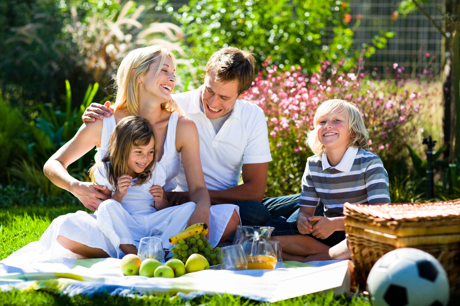 Healthy family who know why they need probiotic supplements.  Our ancestors got their probiotics from food but that is very difficult to do today.